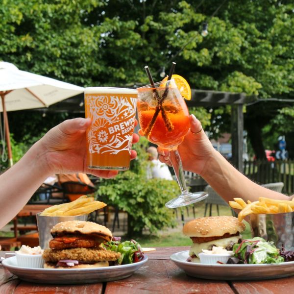 Summer burgers paired with drink deals in the pub garden