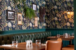 Bench dining area with green backing